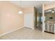 Open dining area with tile floors conveniently located near the kitchen at 4026 Navigator Way, Kissimmee, FL 34746