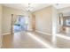 Spacious living room with tile flooring and sliding glass doors leading to outdoor area at 4026 Navigator Way, Kissimmee, FL 34746