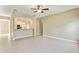 Open living area with tile floors and convenient pass-through to kitchen at 4026 Navigator Way, Kissimmee, FL 34746