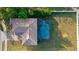 Aerial view showing house, pool, and backyard at 213 Aidans Ldg, Haines City, FL 33844