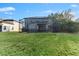 Backyard with large screened pool and patio at 213 Aidans Ldg, Haines City, FL 33844