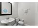 Small bathroom with pedestal sink and toilet at 213 Aidans Ldg, Haines City, FL 33844