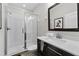 Clean bathroom with walk-in shower, vanity, and modern fixtures at 213 Aidans Ldg, Haines City, FL 33844