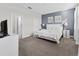 Spacious bedroom with a king-size bed and ensuite bathroom at 213 Aidans Ldg, Haines City, FL 33844