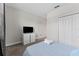 Simple bedroom with a full-size bed and built-in dresser at 213 Aidans Ldg, Haines City, FL 33844