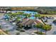 Community clubhouse and pool with palm trees at 213 Aidans Ldg, Haines City, FL 33844