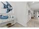 Bright and airy entryway with tile floors and modern decor at 213 Aidans Ldg, Haines City, FL 33844