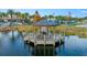 Gazebo on a wooden deck overlooking a lake at 213 Aidans Ldg, Haines City, FL 33844