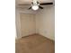 Bedroom with ceiling fan and double door closet at 3637 Dale St, Lakeland, FL 33812