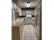 Galley kitchen with ample counter space and cabinets at 3637 Dale St, Lakeland, FL 33812