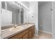 Bathroom with double vanity and updated fixtures at 10555 Leader Ln, Orlando, FL 32825