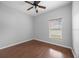 Bright bedroom with wood flooring and ceiling fan at 10555 Leader Ln, Orlando, FL 32825
