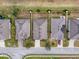 Aerial view of houses and street at 2130 Sequoia Way, Davenport, FL 33896