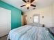 Bedroom with ceiling fan and light blue walls at 2130 Sequoia Way, Davenport, FL 33896