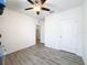 Spacious bedroom with ceiling fan and closet at 2130 Sequoia Way, Davenport, FL 33896