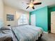 Bright bedroom with ceiling fan and window at 2130 Sequoia Way, Davenport, FL 33896
