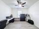 Home office with desk, chair and storage at 2130 Sequoia Way, Davenport, FL 33896