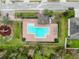 Community pool with surrounding patio and lounge chairs at 2130 Sequoia Way, Davenport, FL 33896
