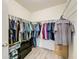 Large walk-in closet with ample hanging space and shelving at 2130 Sequoia Way, Davenport, FL 33896