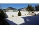 Spacious backyard with patio, privacy fence, and built-in grill at 2180 Nighthawk Dr, Haines City, FL 33844