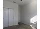 Bedroom with double door closet and carpet at 2180 Nighthawk Dr, Haines City, FL 33844