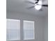 Bright bedroom with ceiling fan and window blinds at 2180 Nighthawk Dr, Haines City, FL 33844