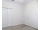 Bright bedroom with neutral walls and carpet at 2180 Nighthawk Dr, Haines City, FL 33844