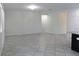 Spacious living room with tile flooring and lots of natural light at 2180 Nighthawk Dr, Haines City, FL 33844