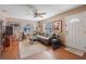 Living room with a gray couch and wood floors at 2259 Minnesota Ave, Winter Park, FL 32789