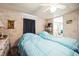 Bedroom with two twin beds, dresser, and access to bathroom at 6055 Grand Oaks Se Dr, Winter Haven, FL 33884