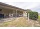 Covered carport with storage and bicycles at 6055 Grand Oaks Se Dr, Winter Haven, FL 33884
