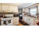 Efficient kitchen features ample cabinetry and modern appliances at 6055 Grand Oaks Se Dr, Winter Haven, FL 33884