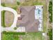 Overhead view of house with brown roof and pool at 2715 Sw 177Th Place Rd, Ocala, FL 34473