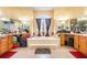 Large bathroom with double sinks, a soaking tub, and separate shower at 2715 Sw 177Th Place Rd, Ocala, FL 34473
