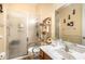 Bathroom with shower, toilet and raised toilet seat at 2715 Sw 177Th Place Rd, Ocala, FL 34473