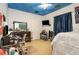 Bedroom with a bed, dresser, and painted ceiling at 2715 Sw 177Th Place Rd, Ocala, FL 34473