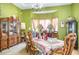Formal dining room with large table, hutch, and window seat at 2715 Sw 177Th Place Rd, Ocala, FL 34473