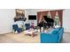 Living room with a grand piano and access to backyard at 2715 Sw 177Th Place Rd, Ocala, FL 34473