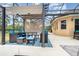Covered patio with seating area for outdoor relaxation at 2715 Sw 177Th Place Rd, Ocala, FL 34473