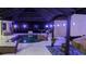 Night view of a pool and spa with covered patio at 2715 Sw 177Th Place Rd, Ocala, FL 34473