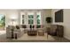 Spacious living room with sectional sofa and neutral color palette at 4807 Waltham Forest Dr, Davenport, FL 33837