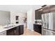 Modern kitchen with stainless steel appliances and an island at 5331 Dagenham Dr, Davenport, FL 33837