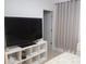 Bedroom with television and neutral color scheme at 621 San Augusto Dr, Poinciana, FL 34759