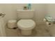 Clean, white toilet in a well-maintained bathroom at 621 San Augusto Dr, Poinciana, FL 34759