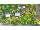 Aerial view showcasing home, detached garage, and expansive lot at 1528 Walker Rd, Lakeland, FL 33810