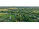 An aerial view showcasing the home's setting in a rural landscape at 1528 Walker Rd, Lakeland, FL 33810