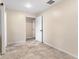 Spacious bedroom with tile floors and access to hallway at 1528 Walker Rd, Lakeland, FL 33810