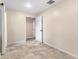 Empty bedroom with neutral walls and tile flooring at 1528 Walker Rd, Lakeland, FL 33810