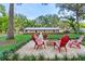 House exterior with fire pit and seating area at 1528 Walker Rd, Lakeland, FL 33810