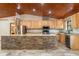 Modern kitchen featuring granite countertops and stainless steel appliances at 1528 Walker Rd, Lakeland, FL 33810